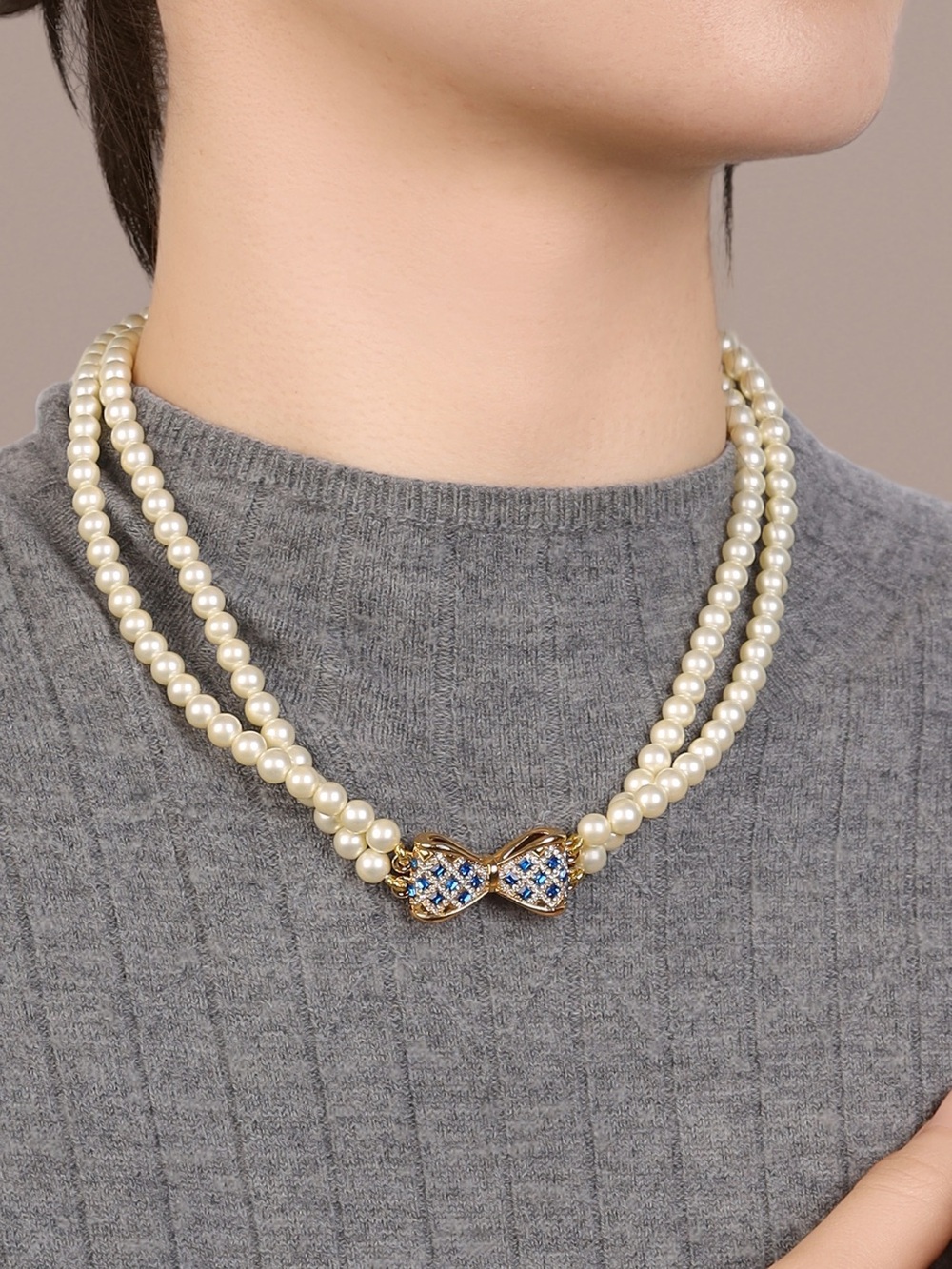 Classic Double-Strand Pearl Necklace with Blue Crystal Bow